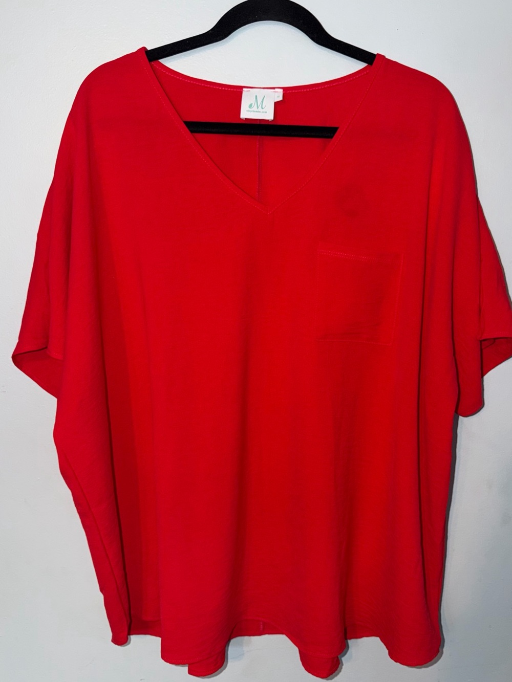 Red V-Neck Oversized Tunic Top by Shop the Mint.